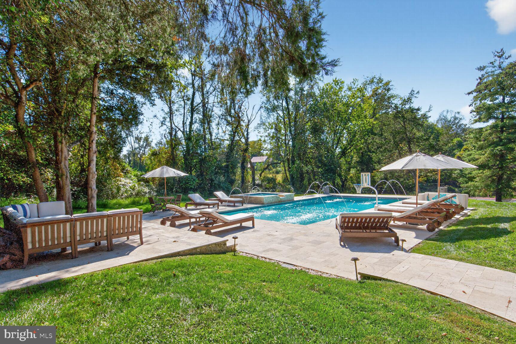 6705 Cedar View Court Clifton, VA 20124 - Photo 41 of 72 a view of a backyard with wooden fence and a slide