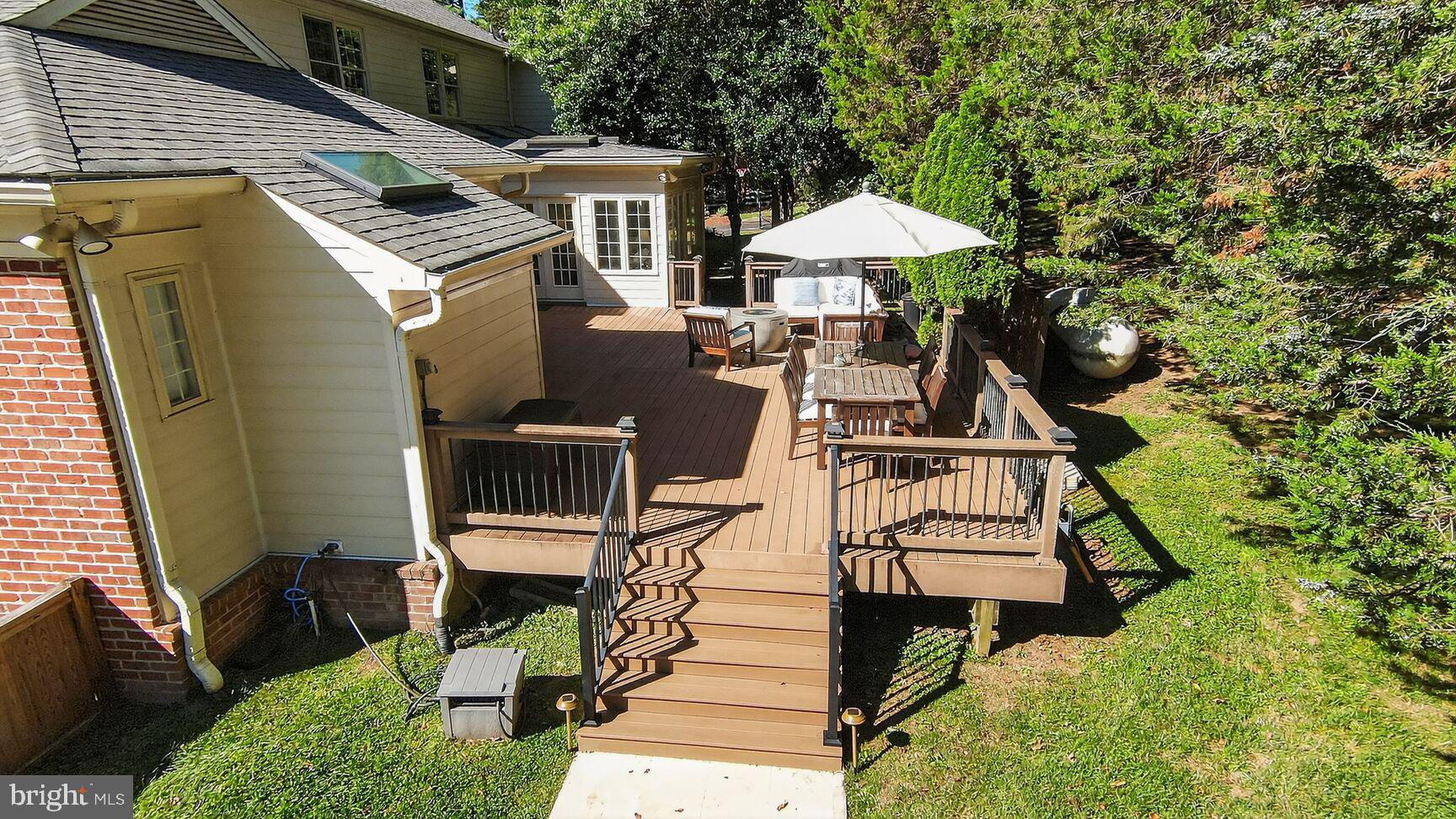 6705 Cedar View Court Clifton, VA 20124 - Photo 46 of 72 a view of a patio with chairs and a barbeque