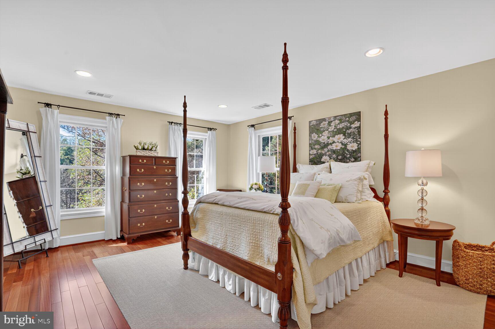 6705 Cedar View Court Clifton, VA 20124 - Photo 54 of 72 a bedroom with a bed window and a flat tv screen