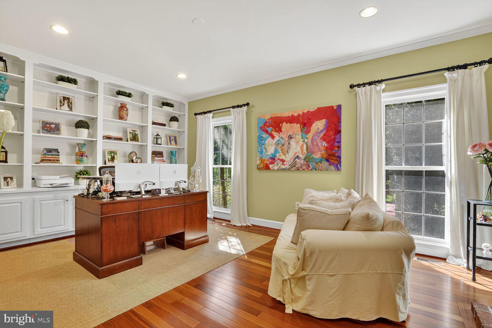 6705 Cedar View Court Clifton, VA 20124 - Photo 57 of 72 a living room with furniture window and a wooden floor