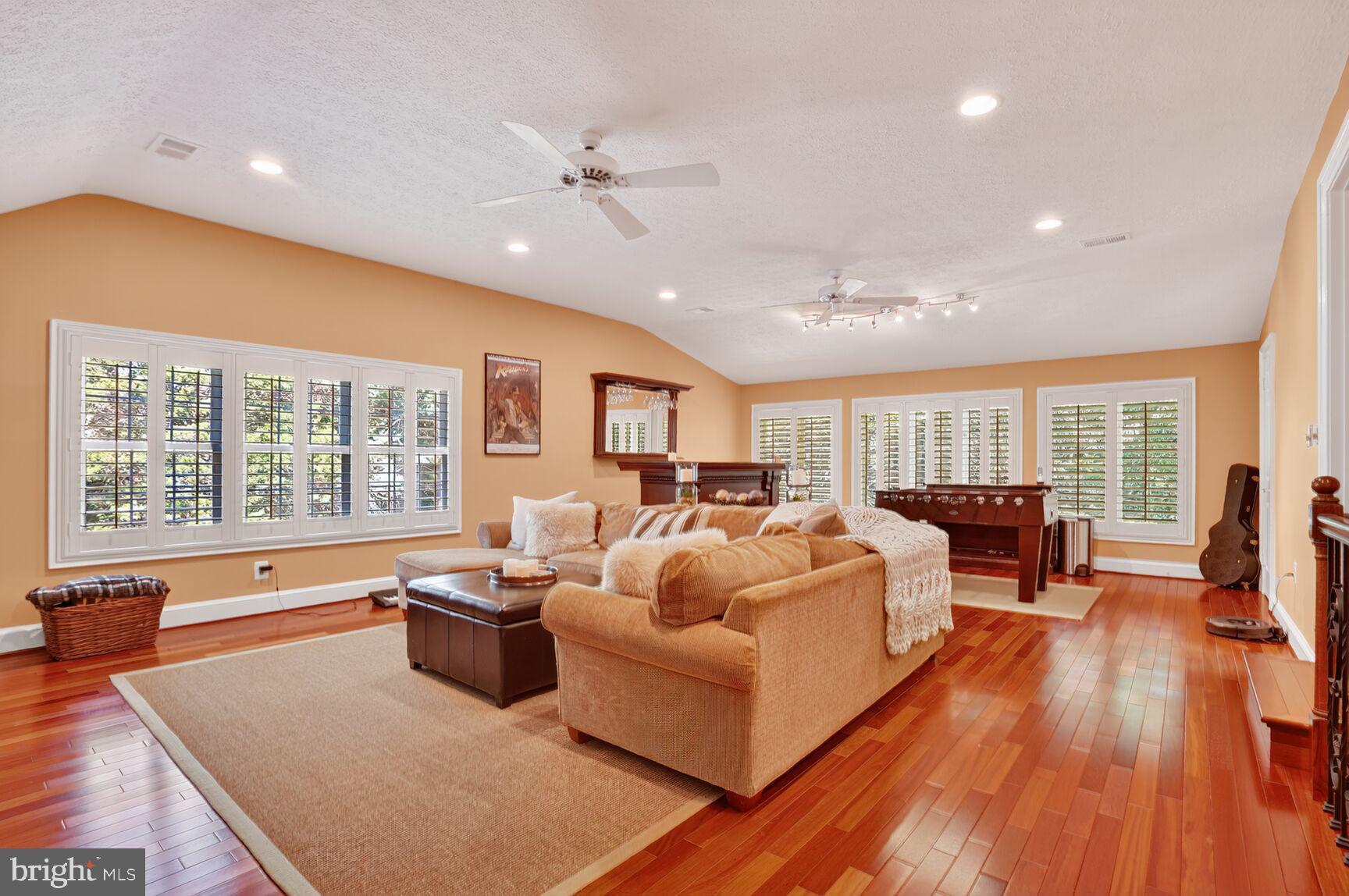 6705 Cedar View Court Clifton, VA 20124 - Photo 59 of 72 a living room with furniture and large windows