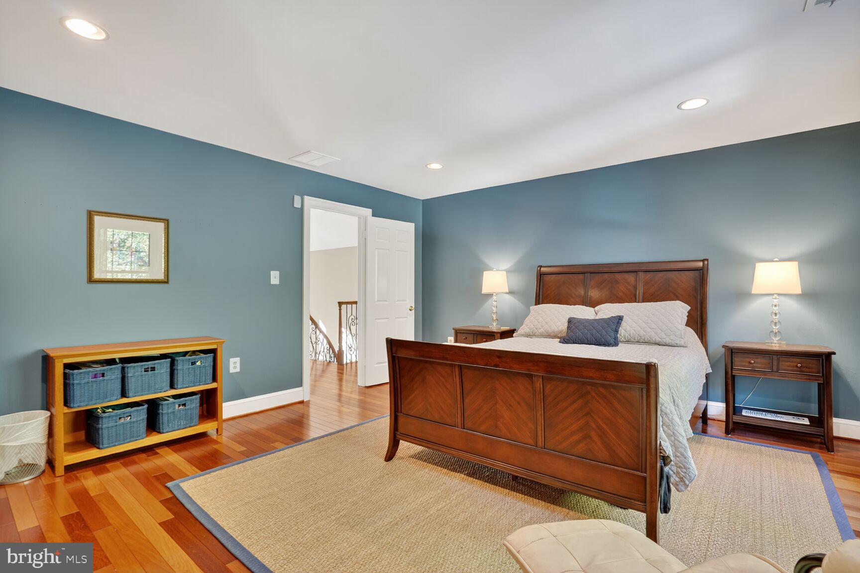 6705 Cedar View Court Clifton, VA 20124 - Photo 64 of 72 a bedroom with a bed and a dresser