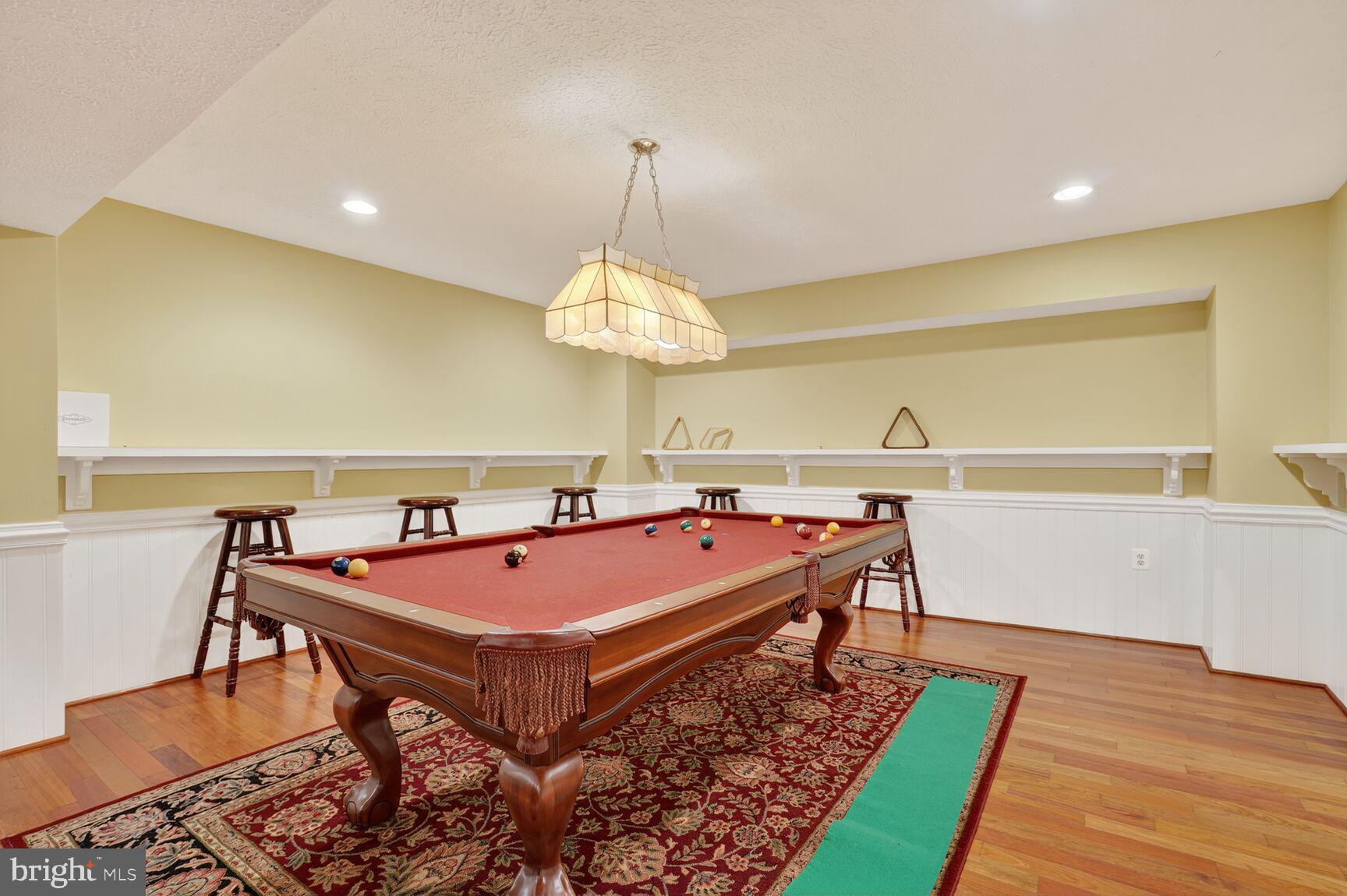 6705 Cedar View Court Clifton, VA 20124 - Photo 66 of 72 a living room with a table tennis table and chairs