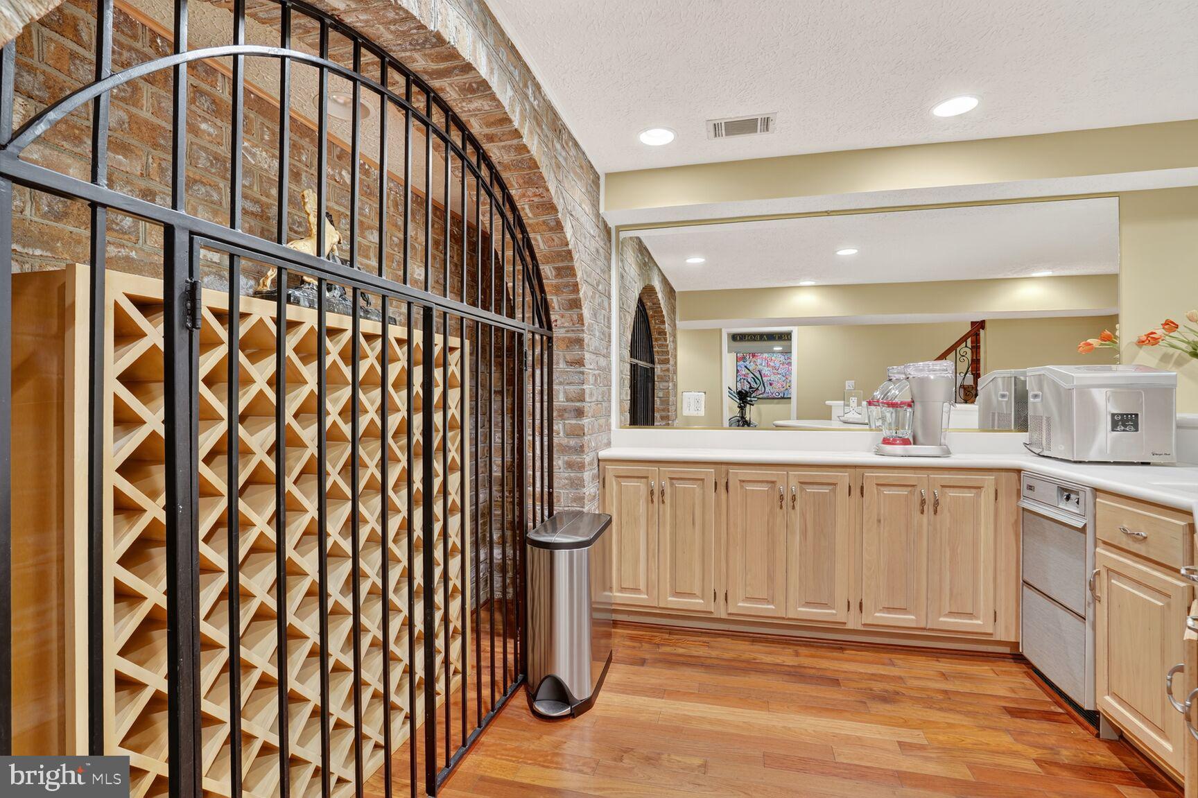 6705 Cedar View Court Clifton, VA 20124 - Photo 68 of 72 a bathroom with a sink a mirror and shower