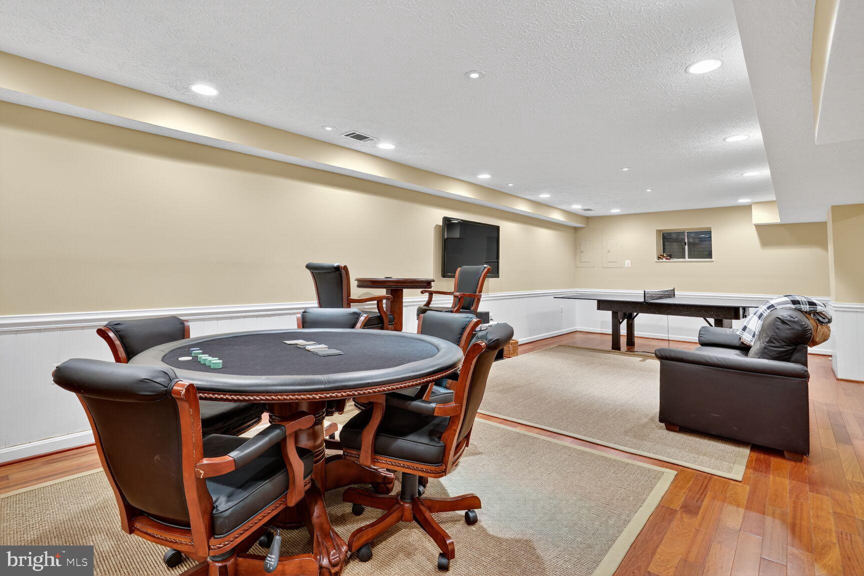 6705 Cedar View Court Clifton, VA 20124 - Photo 69 of 72 a dining room with furniture and wooden floor