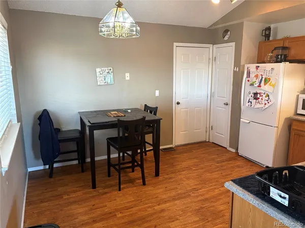 a view of a dining room with furniture