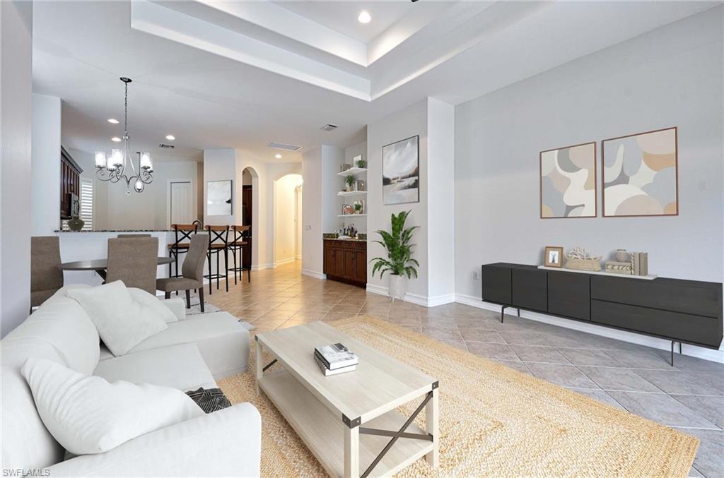 7409 Moorgate Point Way Naples, FL 34113 - Photo 1 of 42 LIVING AREA VIRTUALLY STAGED