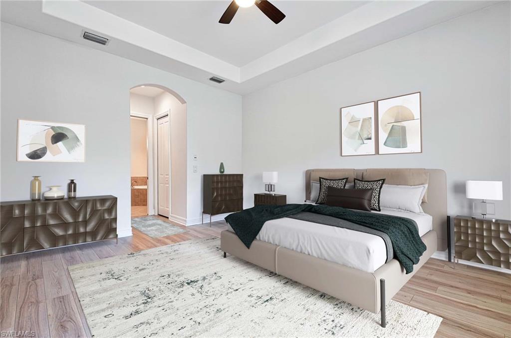 7409 Moorgate Point Way Naples, FL 34113 - Photo 19 of 42 MASTER BEDROOM VIRTUALLY STAGED