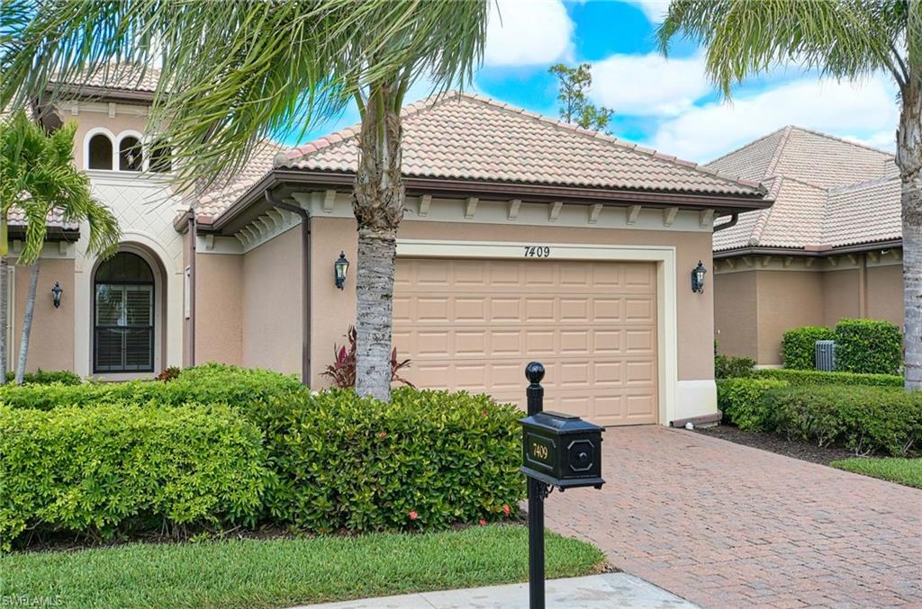 7409 Moorgate Point Way Naples, FL 34113 - Photo 2 of 42 FRONT