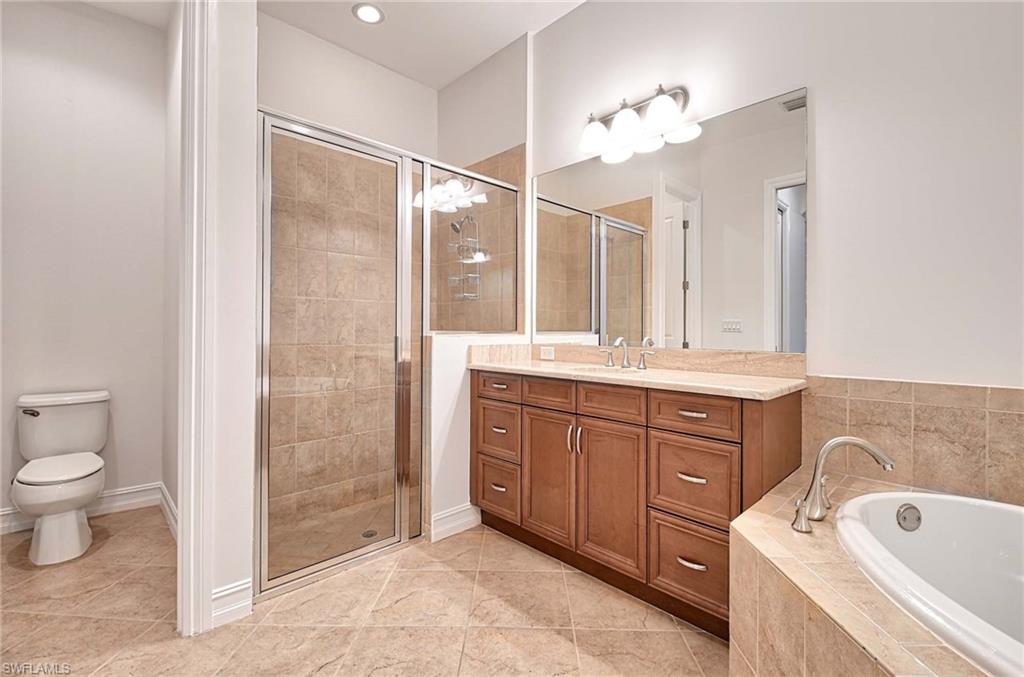 7409 Moorgate Point Way Naples, FL 34113 - Photo 20 of 42 MASTER BATHROOM