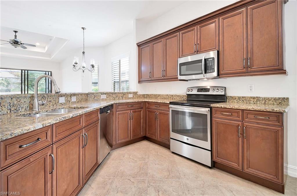 7409 Moorgate Point Way Naples, FL 34113 - Photo 7 of 42 KITCHEN