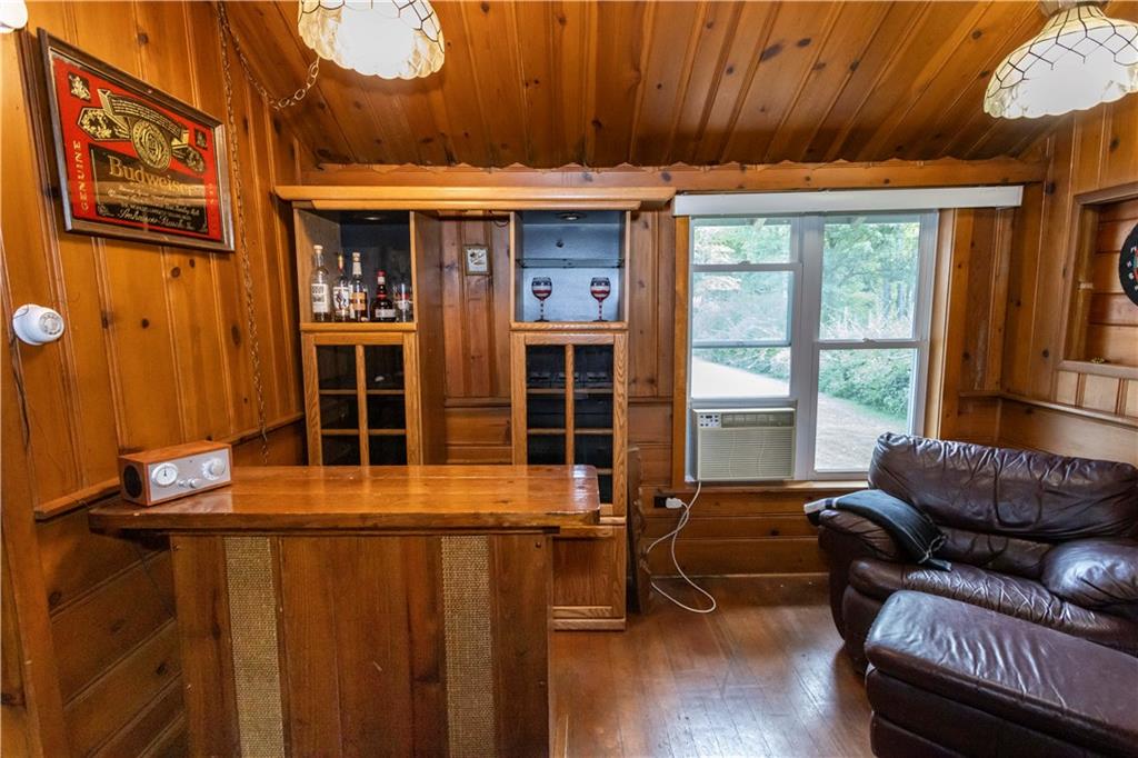 526 Nebo Road Champion, PA 15622 - Photo 13 of 30 a living room with furniture window and wooden floor
