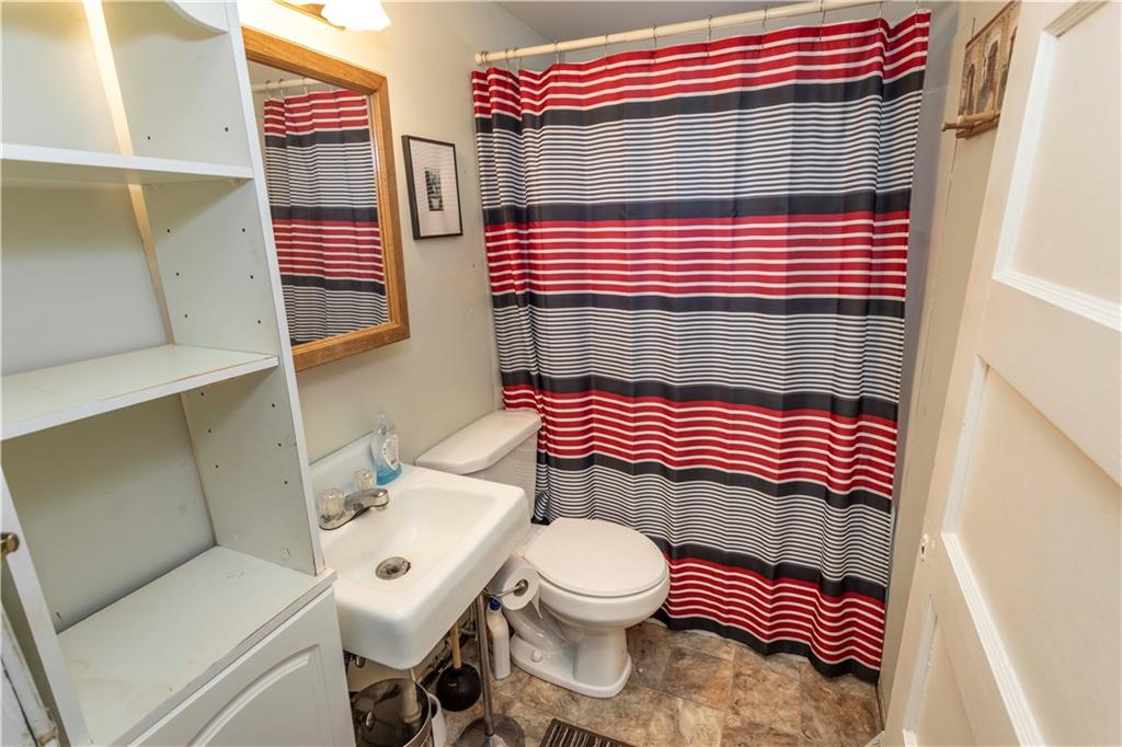 526 Nebo Road Champion, PA 15622 - Photo 17 of 30 a bathroom with a toilet and a sink