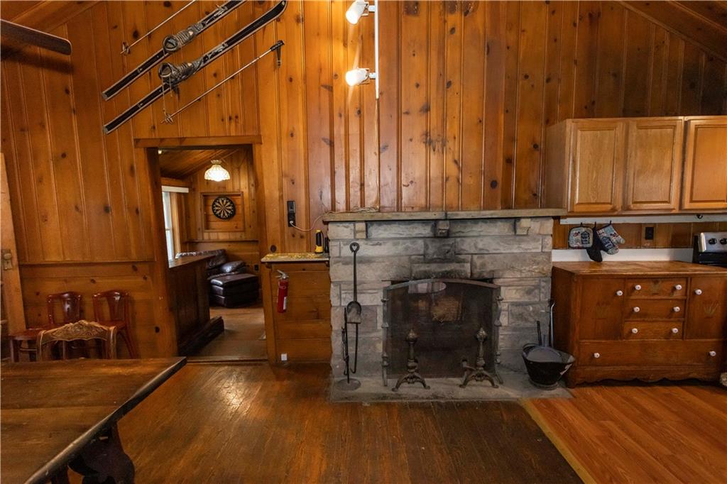 526 Nebo Road Champion, PA 15622 - Photo 8 of 30 a kitchen with a sink and a fireplace