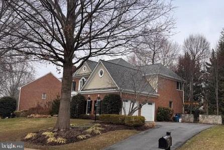 2771 Cody Road Vienna, VA 22181 - Photo 3 of 4 a front view of a house with a yard