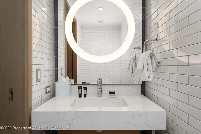 a view of a hallway with washer and dryer