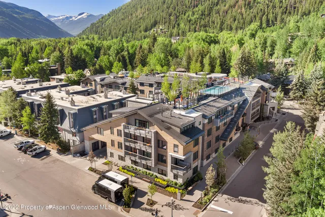 a view of yard with swimming pool and outdoor seating