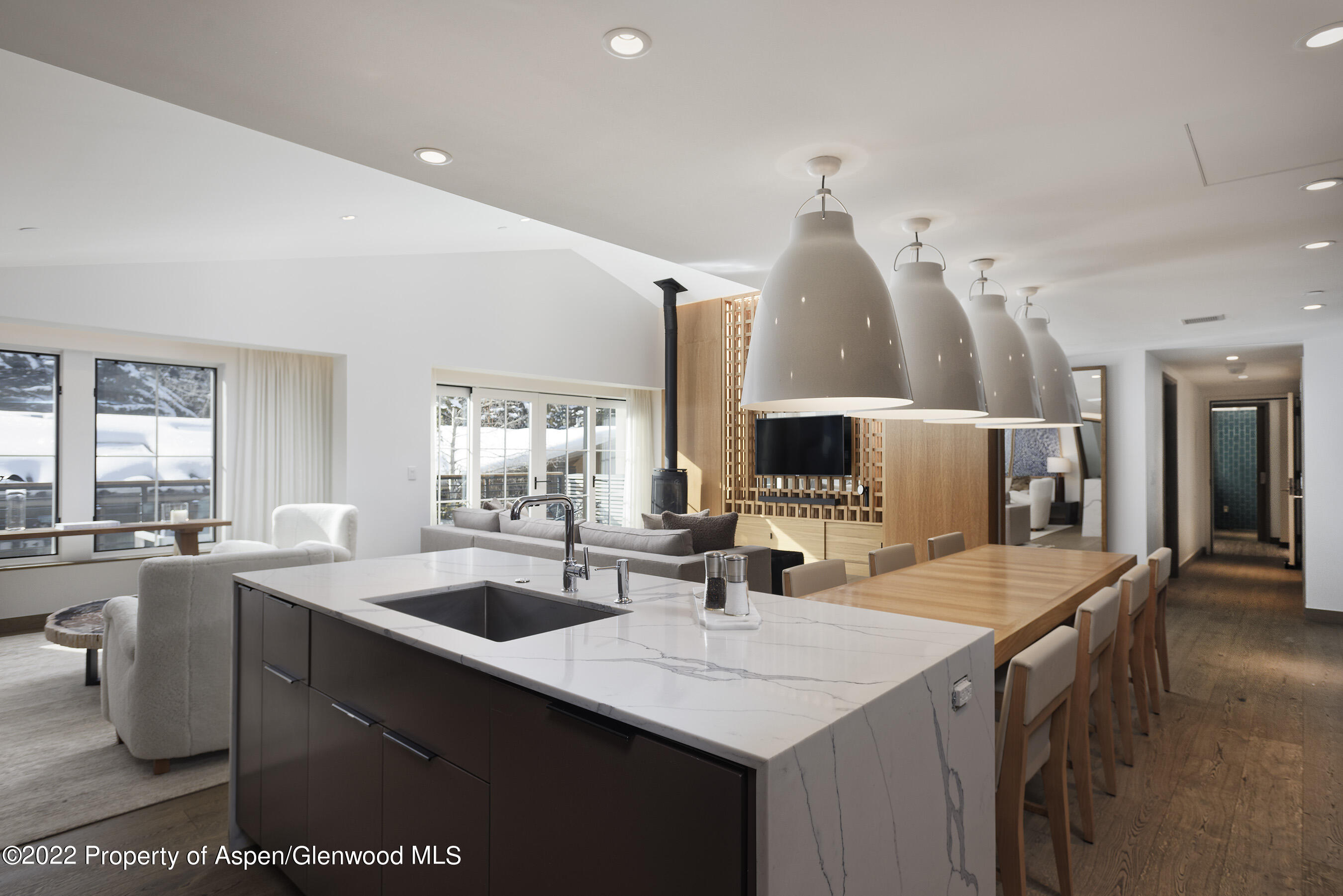 550 South Spring Street, Unit 392 Aspen, CO 81611 - Photo 8 of 41 a kitchen with a sink appliances and a large window