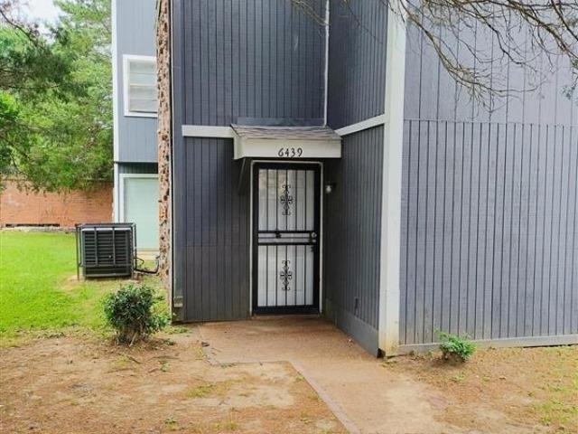6439 Kirby Trees Drive, Unit 6439 Memphis, TN 38115 - Photo 1 of 17 a house view with a outdoor space