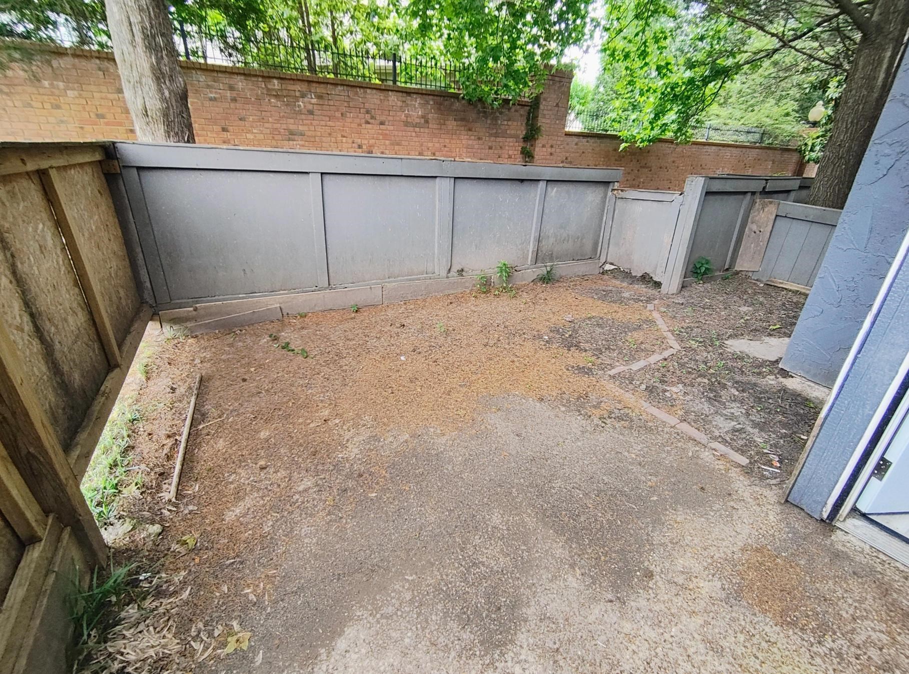 6439 Kirby Trees Drive, Unit 6439 Memphis, TN 38115 - Photo 13 of 17 a backyard of a house