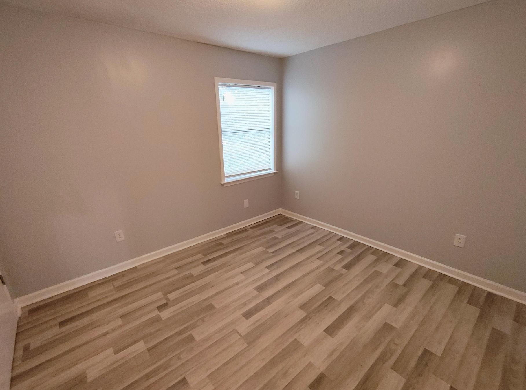 6439 Kirby Trees Drive, Unit 6439 Memphis, TN 38115 - Photo 5 of 17 an empty room with a window