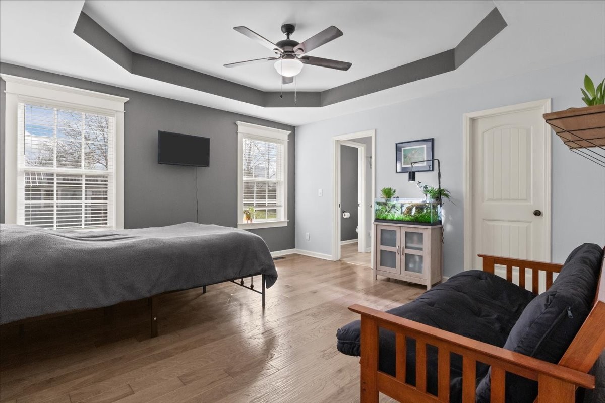 459 Diane Loop White Bluff, TN 37187 - Photo 13 of 35 a bedroom with furniture and windows