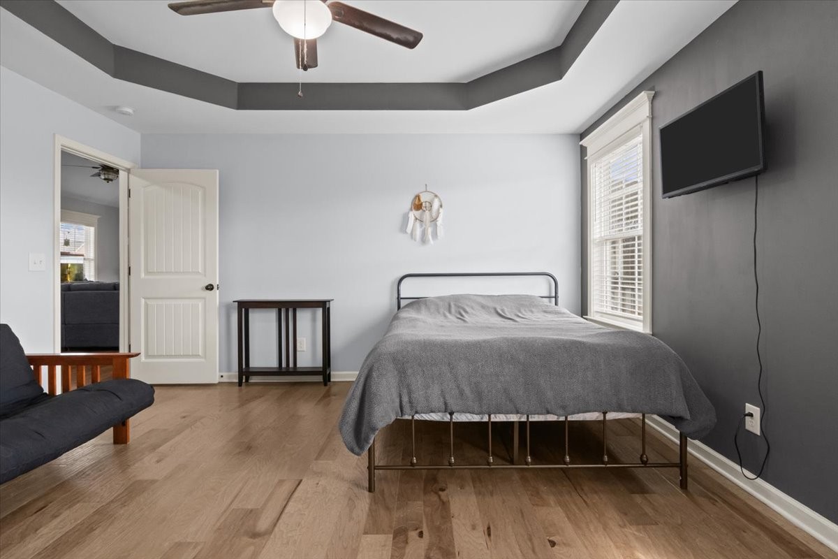 459 Diane Loop White Bluff, TN 37187 - Photo 15 of 35 a bedroom with a bed and a flat screen tv