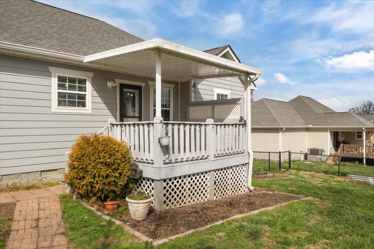 459 Diane Loop White Bluff, TN 37187 - Photo 26 of 35 a front view of a house with a garden
