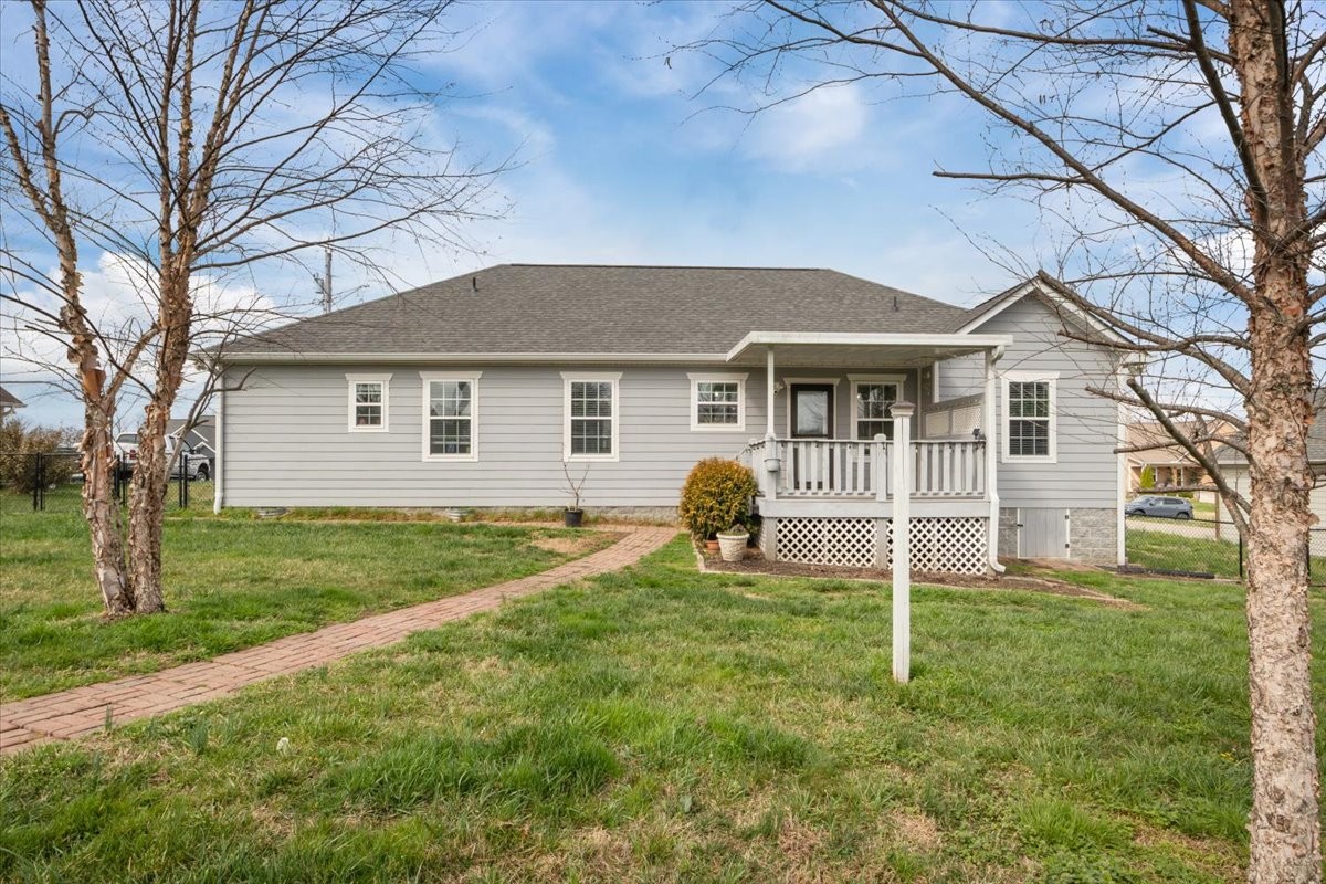 459 Diane Loop White Bluff, TN 37187 - Photo 27 of 35 a backyard of a house with table and chairs