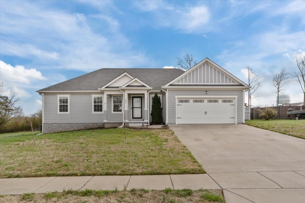 459 Diane Loop White Bluff, TN 37187 - Photo 3 of 35 a front view of a house with a garden