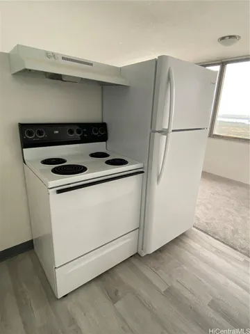 a utility room with washer and dryer