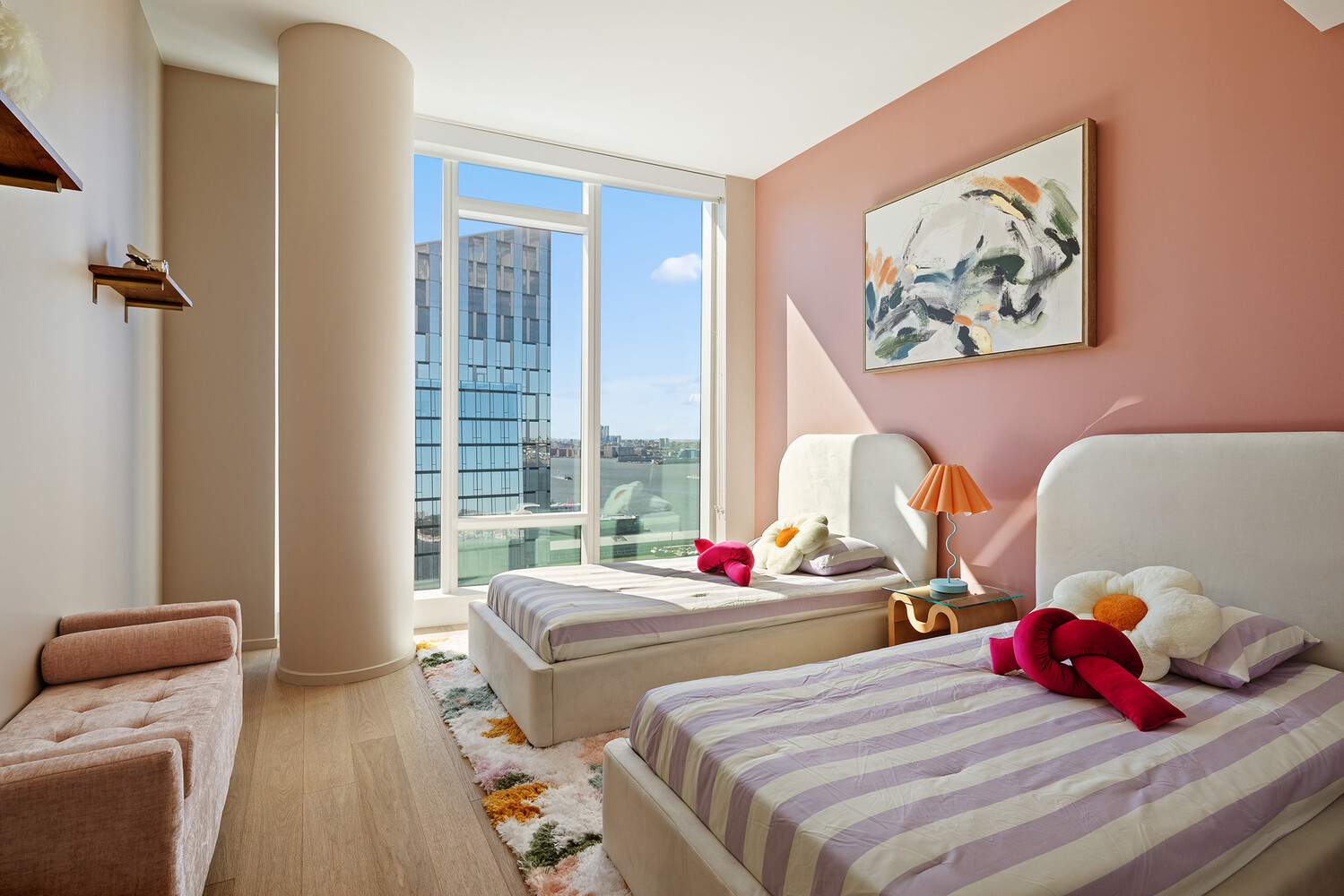 30 Riverside Boulevard, Unit 33A Manhattan, NY 10069 - Photo 14 of 17 a bedroom with two beds and a large window