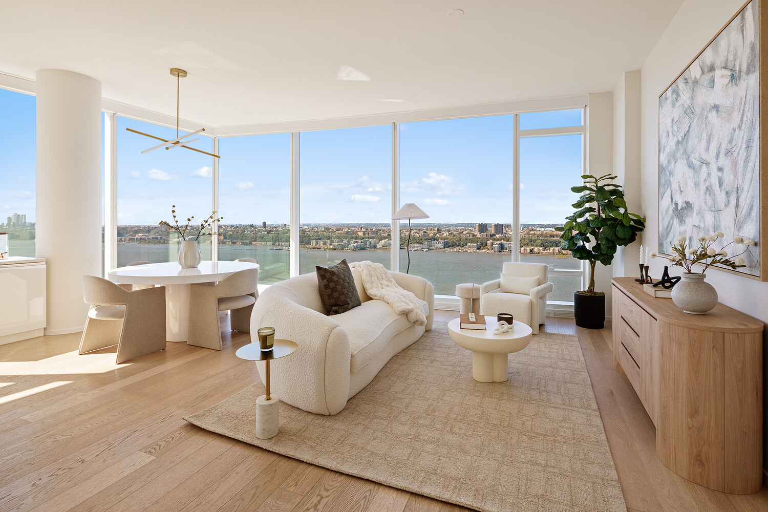 30 Riverside Boulevard, Unit 33A Manhattan, NY 10069 - Photo 3 of 17 a living room with furniture and a large window