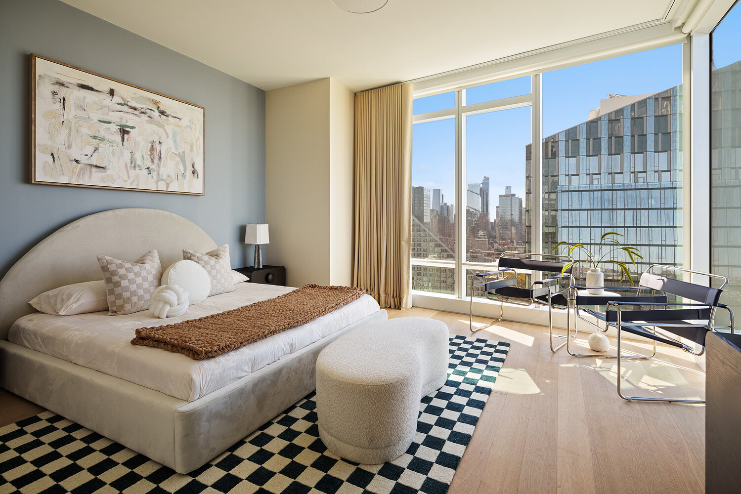 30 Riverside Boulevard, Unit 33A Manhattan, NY 10069 - Photo 7 of 17 a living room with furniture and a large window