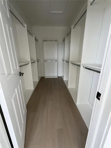 a view of an empty walk in closet
