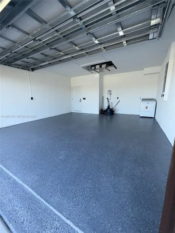 a view of a room with an empty space