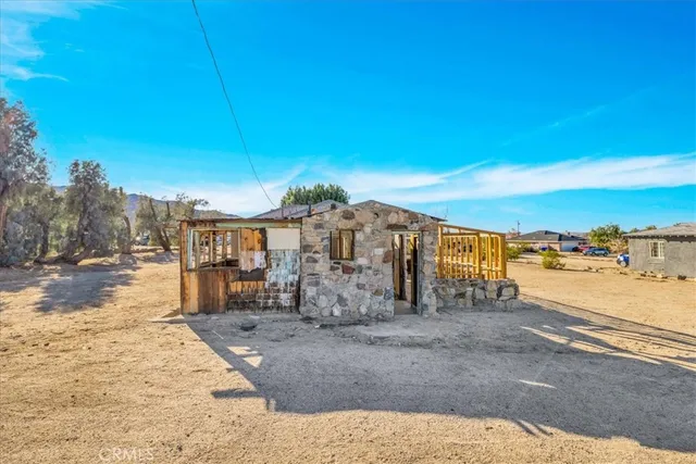 a view of a road with an ocean view
