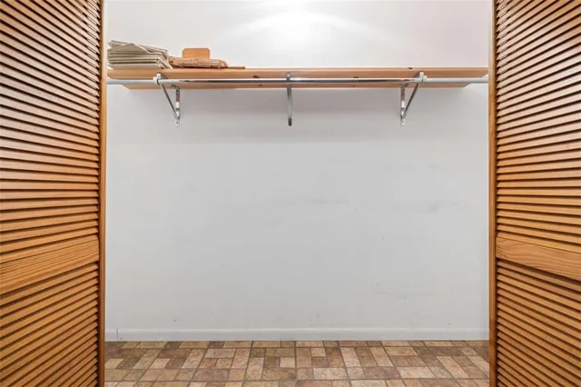 a room with lots of furniture and air hockey table