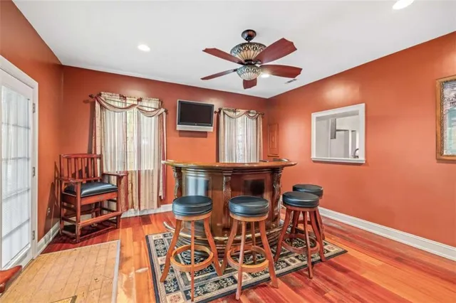 a dinning table and chairs in a room
