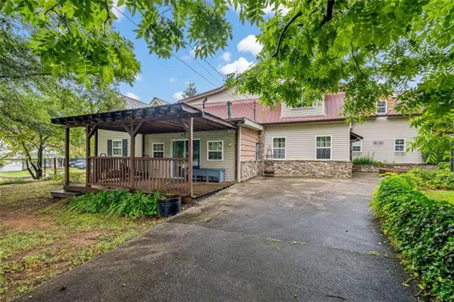 a view of porch with wooden floor in outdoor space