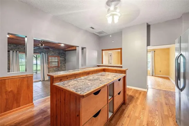 a view of a door and a window