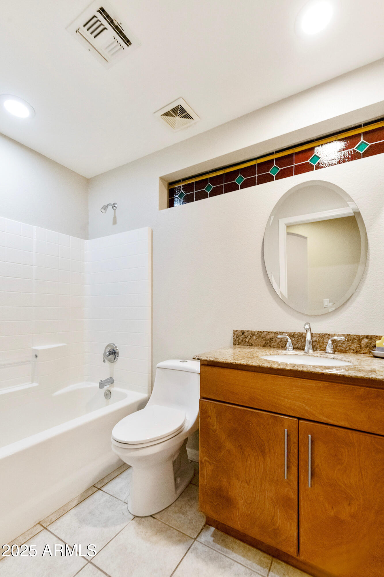 4300 East Cassia Lane Gilbert, AZ 85298 - Photo 18 of 54 a bathroom with a sink mirror vanity and toilet