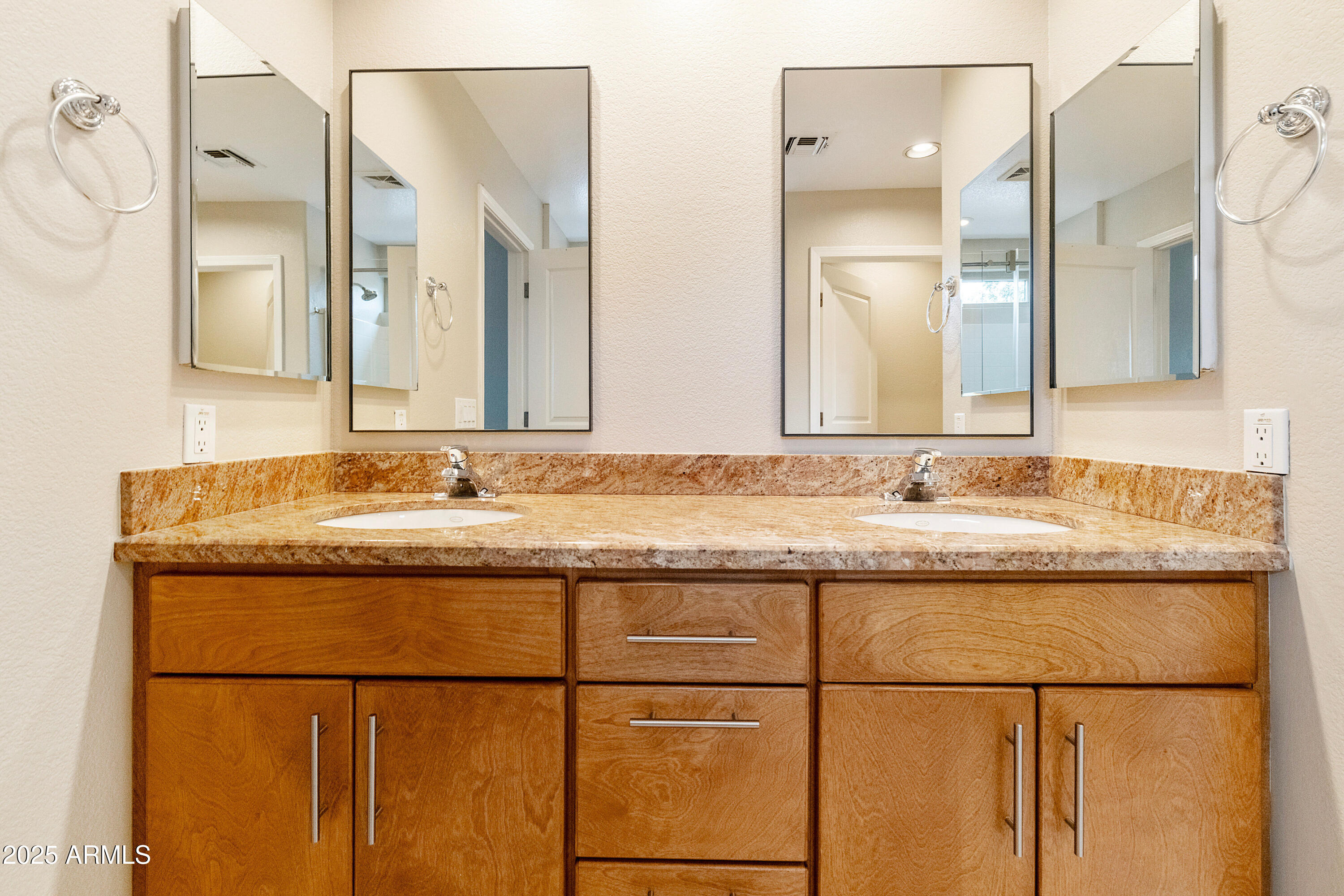 4300 East Cassia Lane Gilbert, AZ 85298 - Photo 22 of 54 a bathroom with a granite countertop sink and a mirror