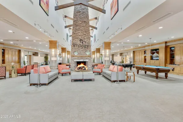 a view of a dining hall with many windows