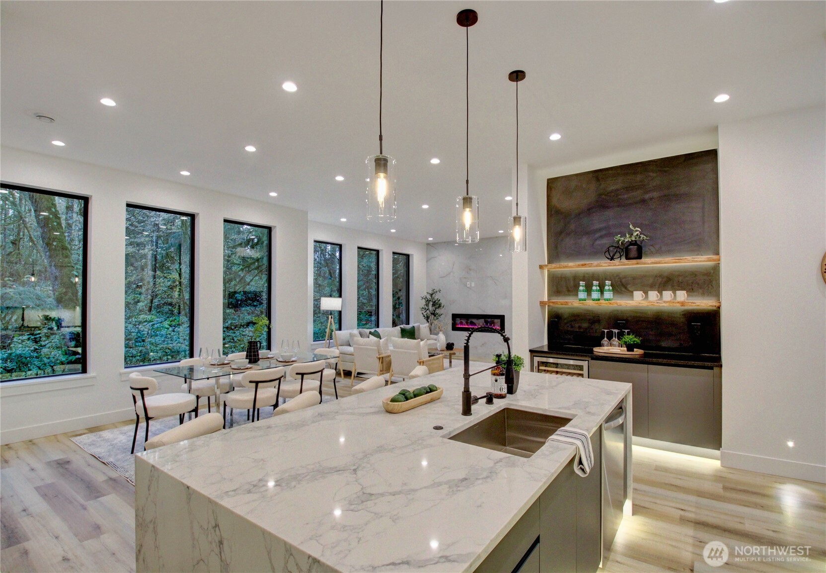 3 Cayuse Court Bellingham, WA 98229 - Photo 18 of 40 a view of a kitchen with kitchen island a large window cabinets and living room view