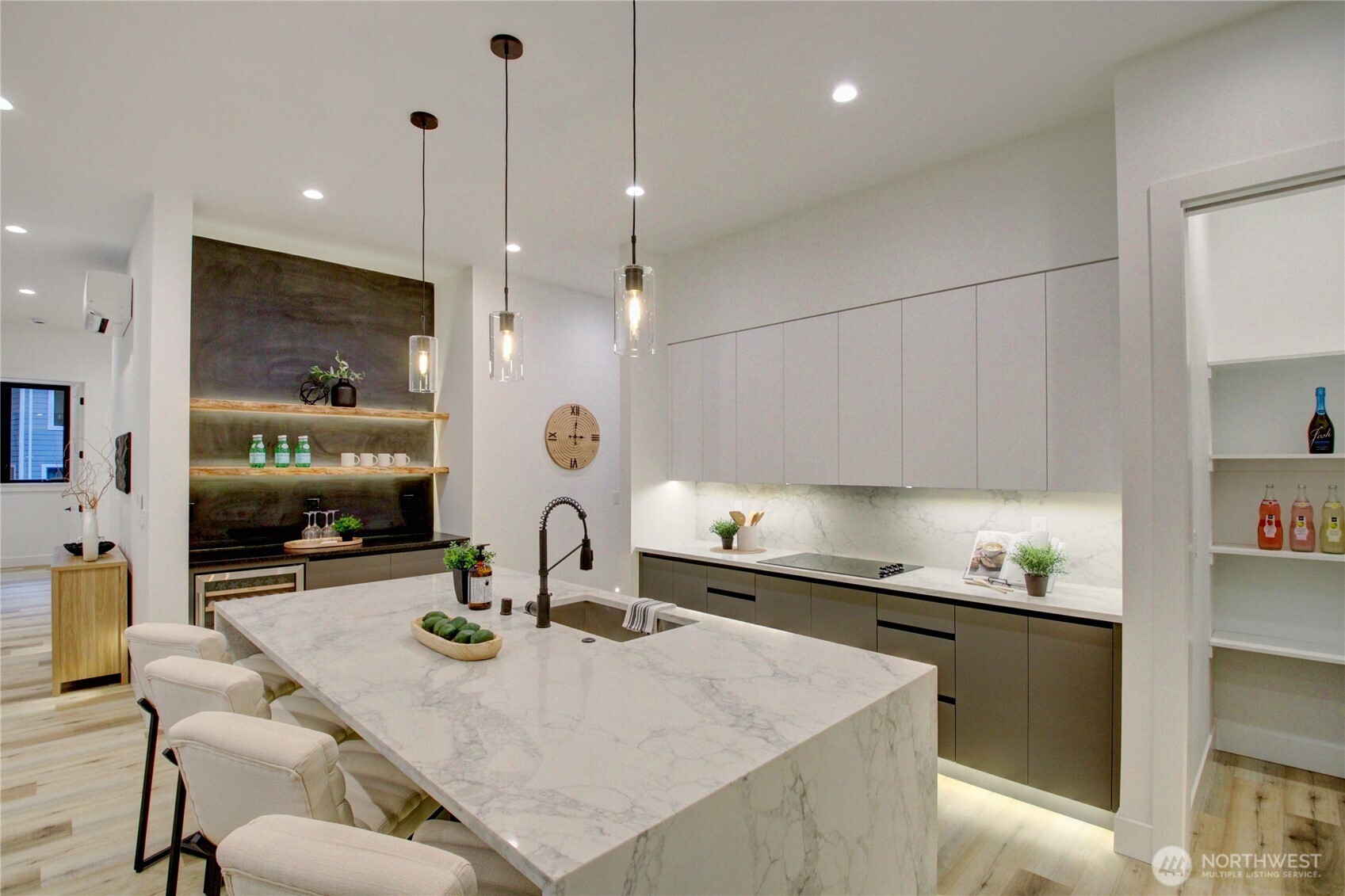 3 Cayuse Court Bellingham, WA 98229 - Photo 19 of 40 a kitchen with a table chairs sink and cabinets