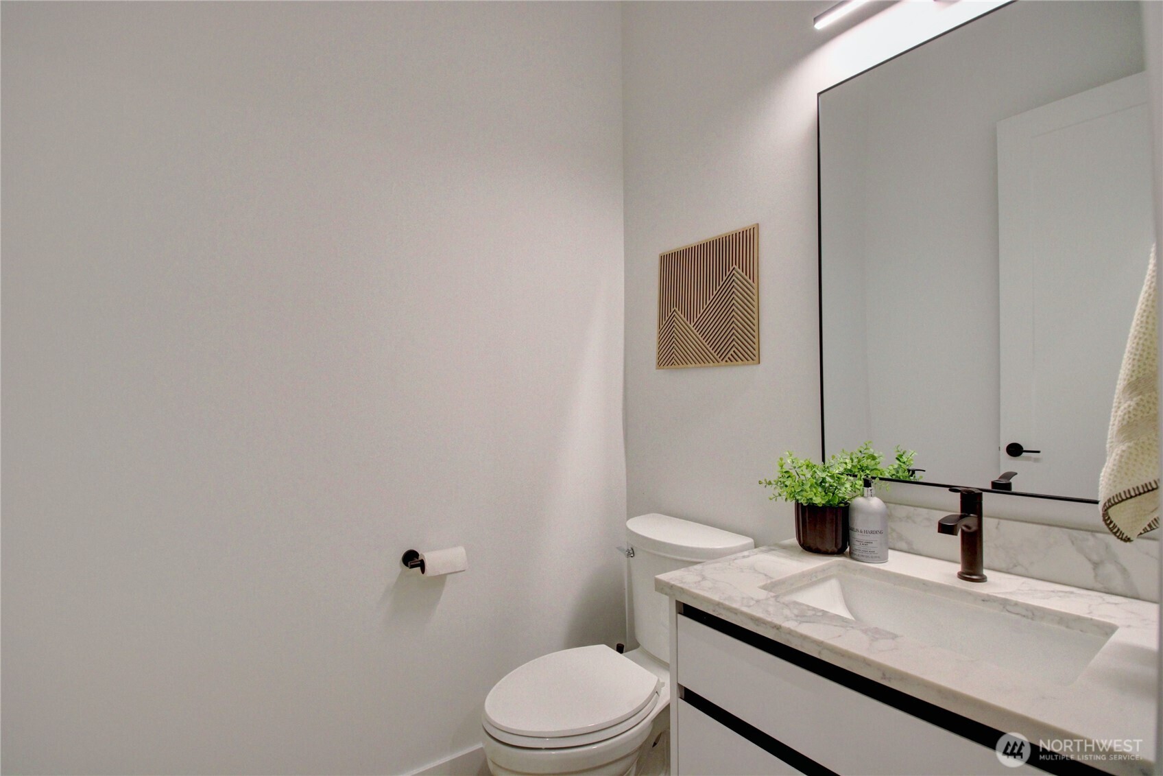 3 Cayuse Court Bellingham, WA 98229 - Photo 25 of 40 a bathroom with a granite countertop sink mirror and toilet