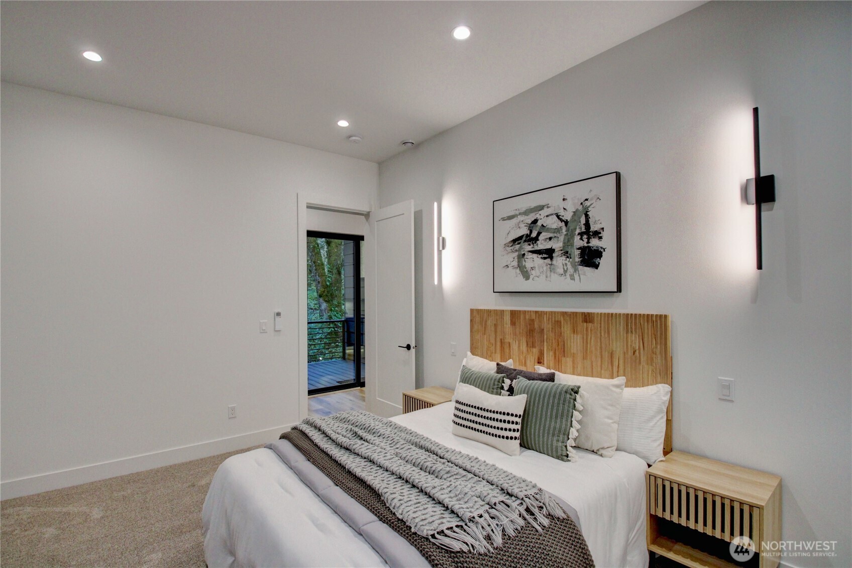 3 Cayuse Court Bellingham, WA 98229 - Photo 27 of 40 a bedroom with a large bed and a window