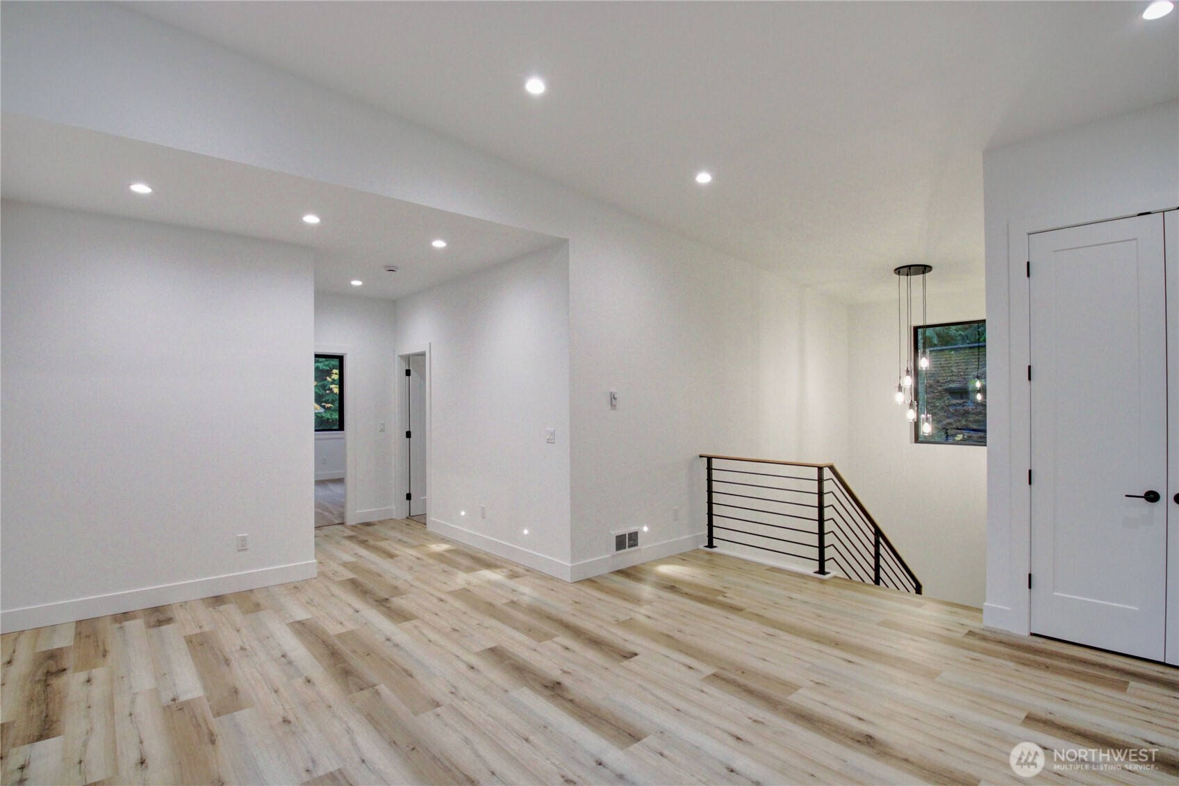 3 Cayuse Court Bellingham, WA 98229 - Photo 37 of 40 a view of a room with wooden floor and stairs