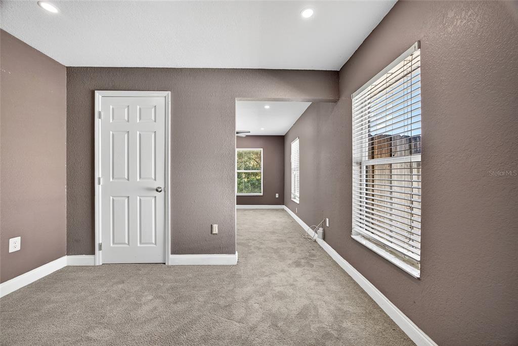 5637 Rhapsody Avenue North Port, FL 34288 - Photo 18 of 34 an empty room with windows